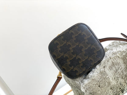MINI VANITY CASE TRIOMPHE CANVAS AND CAFLSKIN TAN