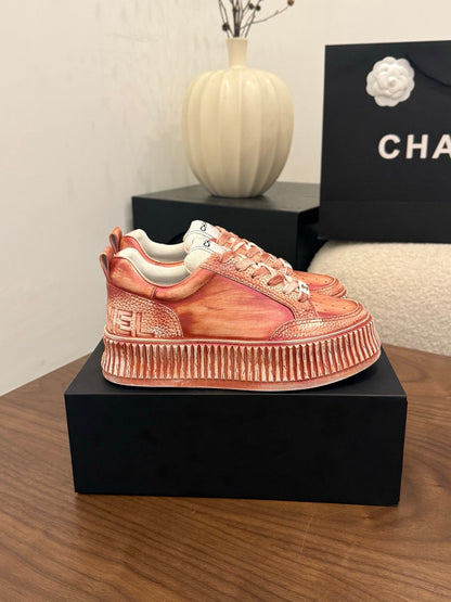 CC 26s Casual Sneaker Coral Orange Leather 183616
