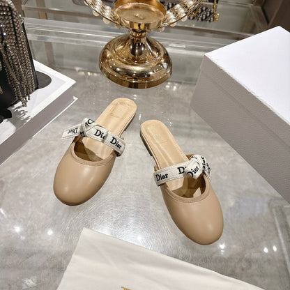 CD 26 Bow Flat Mules Embroidered Sheepskin