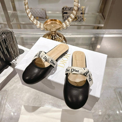 CD 26 Bow Flat Mules Embroidered Sheepskin